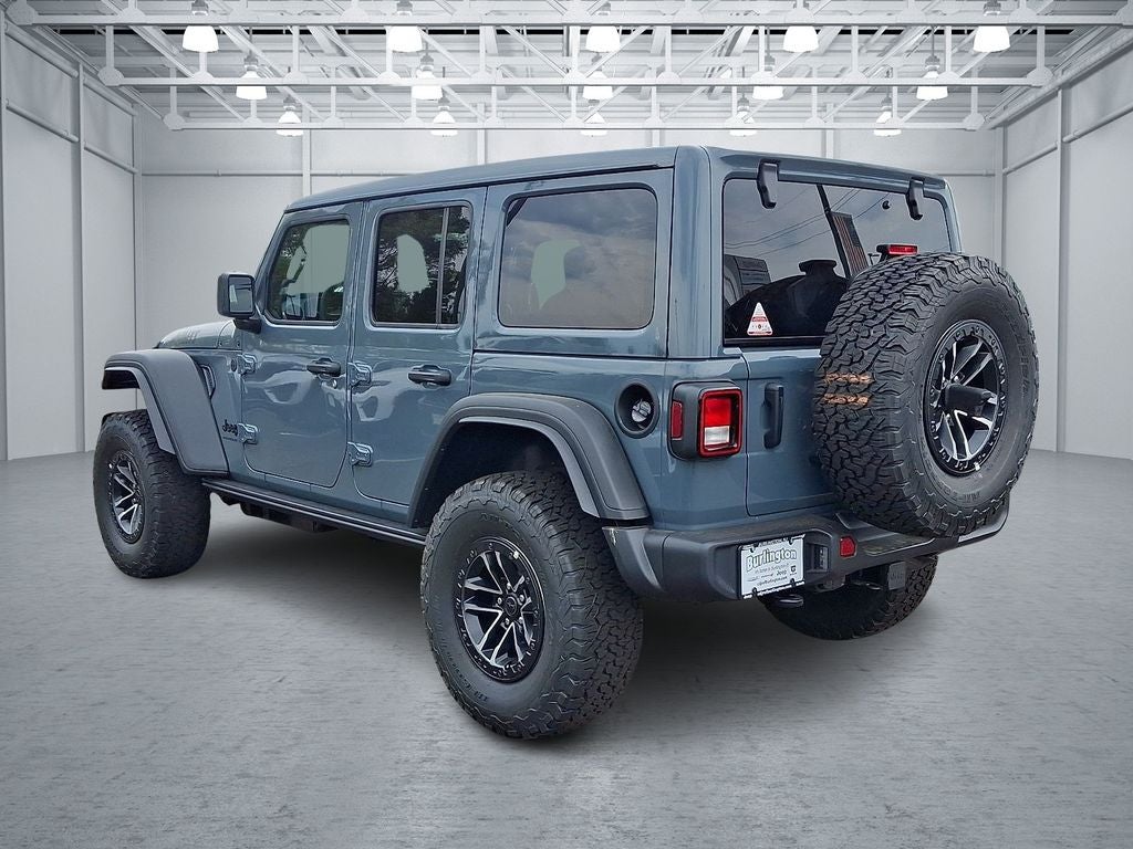 2026 Jeep Wrangler — rear three-quarter view