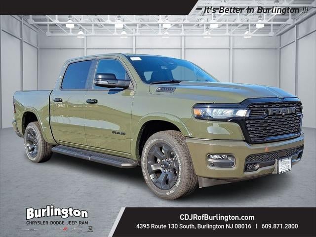 2026 RAM Ram 1500 RAM 1500 BIG HORN CREW CAB 4X4 5'7' BOX in Tank Exterior Paint — front three-quarter view