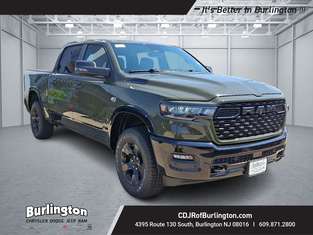 2026 RAM Ram 1500 RAM 1500 BIG HORN CREW CAB 4X4 5'7' BOX in Tank Exterior Paint — front three-quarter view
