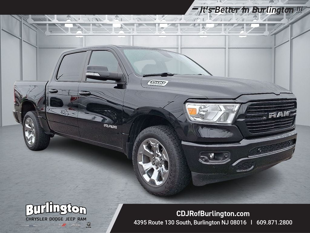 2021 RAM Ram 1500 Big Horn Crew Cab 4x4 5'7' Box in Diamond Black Crystal Pearlcoat — front three-quarter view