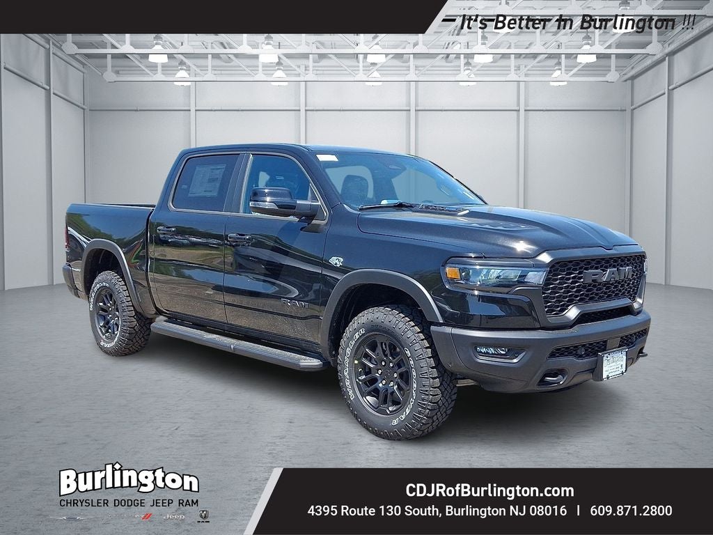 2026 RAM Ram 1500 RAM 1500 REBEL CREW CAB 4X4 5'7' BOX in Diamond Black Crystal Pearl-Coat Exterior Paint — front three-quarter view