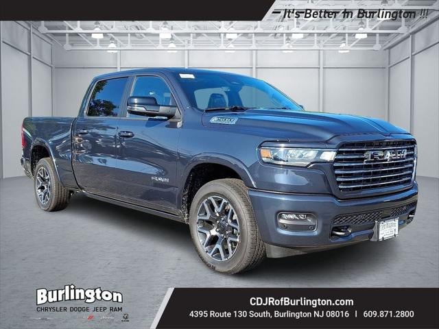 2026 RAM Ram 1500 RAM 1500 LARAMIE CREW CAB 4X4 6'4' BOX in Forged Blue Metallic Exterior Paint — front three-quarter view