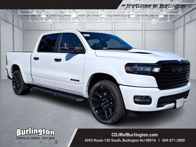 2026 RAM Ram 1500 RAM 1500 LARAMIE CREW CAB 4X4 6'4' BOX in Bright White Clear-Coat Exterior Paint — front three-quarter view