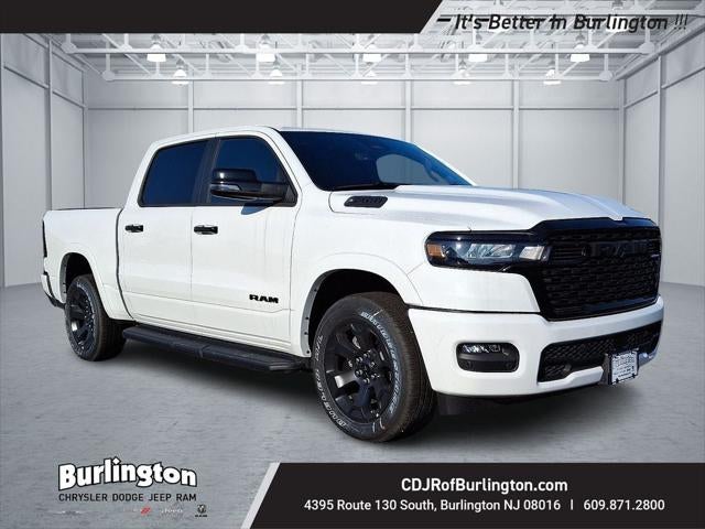 2026 RAM Ram 1500 RAM 1500 BIG HORN CREW CAB 4X4 5'7' BOX in Bright White Clear-Coat Exterior Paint — front three-quarter view
